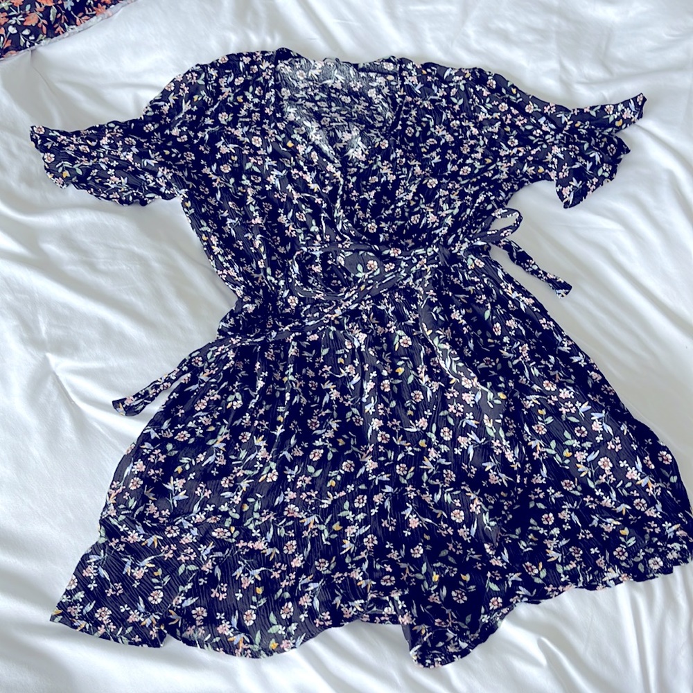 Romper with skirt in front, shorts in back!
